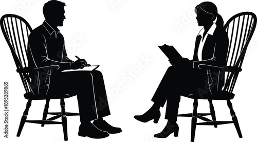Silhouette of man and woman sitting face to face on chairs conducting job interview, therapy session, or professional business consultation