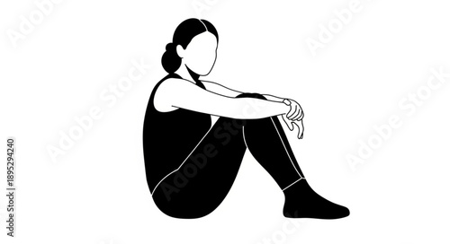 Young woman sitting alone in contemplation.