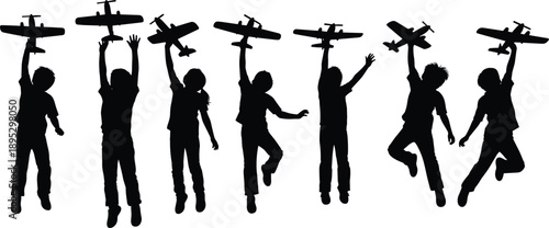 Silhouette set of happy children jumping and playing with toy airplanes in different poses isolated on white background for childhood dreams and aviation concept.