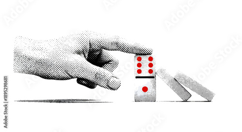 A hand carefully prevents dominoes from falling over on a flat surface from a close-up viewpoint