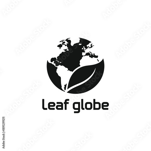 A black silhouette of earth nestled within a leaf symbolizing global ecology
