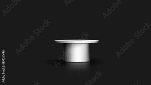 Minimalist white cylindrical pedestal or podium with soft lighting and subtle reflection on a dark gray to black background, ideal for product display or presentation