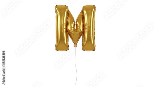 Golden m balloon floating