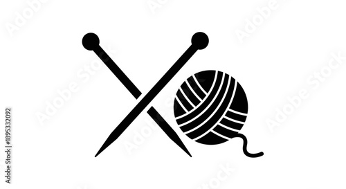 Crossed Knitting Needles with a Ball of Wool