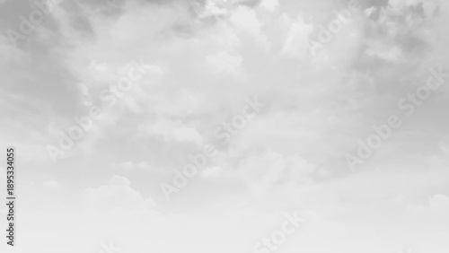 Scenic white clouds atmospheric on gray background. Grey and white oncoming storm clouds photo