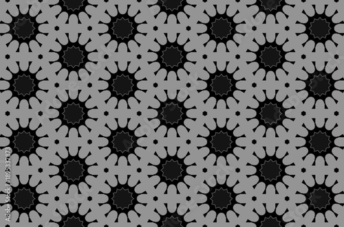 A background pattern of black and gray circles