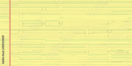 Close up of lined yellow paper with a red margin slightly crumpled