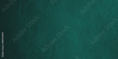 A blank aged green chalkboard texture featuring a rough grunge surface with a vintage paper pattern and dirty paint material for an empty wall backdrop design