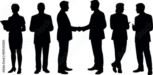 Diverse group of silhouetted business people interacting in a professional setting