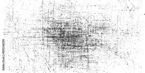 Black and white distressed grunge texture with random scratches and speckles