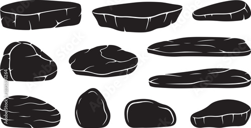 Collection of black stones and rocks in various shapes