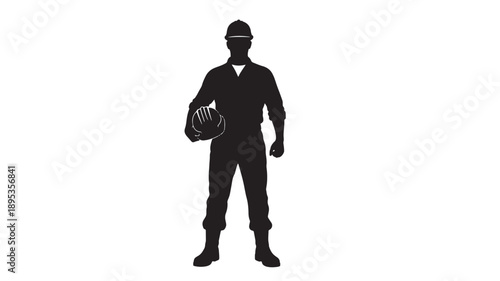 Silhouette of a worker holding a helmet standing confidently in a professional stance on an isolated background from a straightforward viewpoint