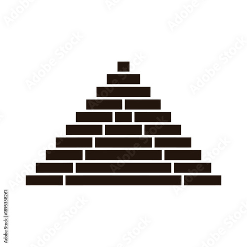 A stylized dark pyramid constructed from rectangular blocks is depicted