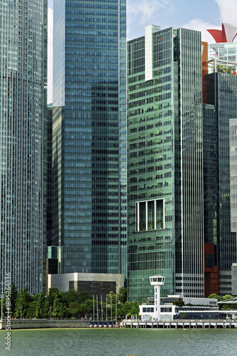 Photography c cityscape in Singapore, where modern high-rise buildings with glass facades dominate the background