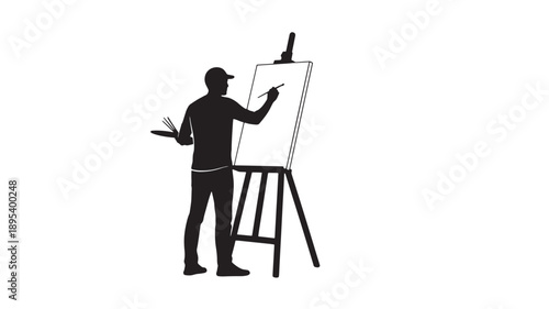 Artist standing in front of easel, painting with brush in hand, creating artwork in studio, silhouette view