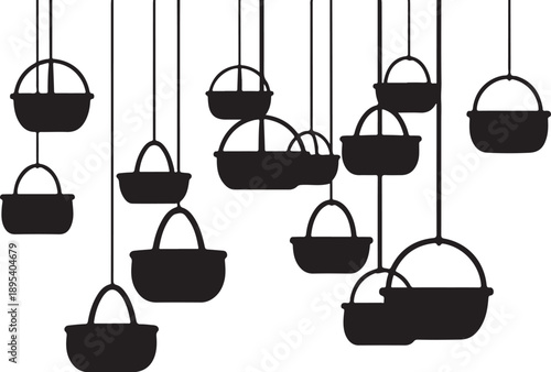 Black hanging baskets suspended from strings in minimalist arrangement