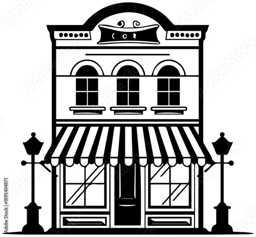 Classic storefront with striped awning and vintage street lamps