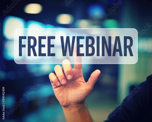 Hand touching free webinar button with blurred background