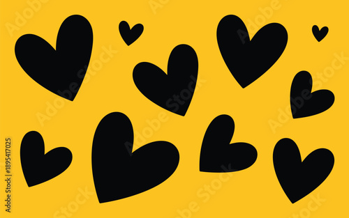Several black heart shapes are scattered randomly across a bright vibrant yellow background