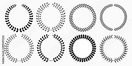 Collection of black laurel wreaths and circular leaf arrangements