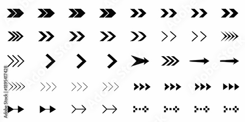 Arrangement of black chevron arrows in varying lengths and orientations