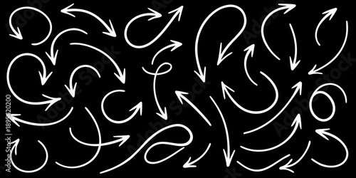A chaotic arrangement of white arrows in various curves and directions