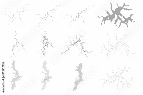 Collection of abstract crack and lightning bolt shapes in grayscale