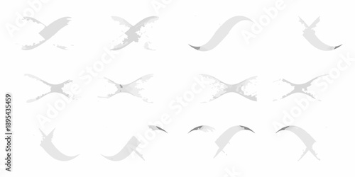 A flock of white birds in flight against a bright background