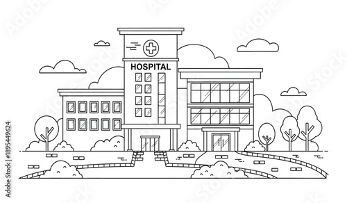 A large hospital building with a clock tower and trees around it