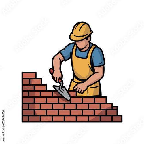 A construction worker building a brick wall with a trowel and safety gear