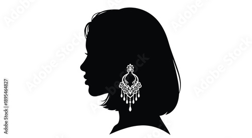 Silhouette of a woman s profile with ornate dangling earring detail