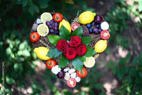 Heart-shaped fruit and flower arrangement
