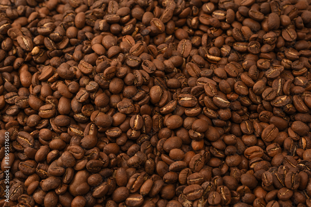 Fototapeta premium Coffee beans on a white background. Coffee beans texture.