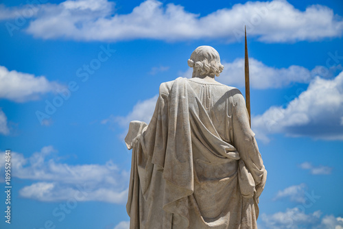 Obraz na plátně A statue of Saint Paul (by Adamo Tadolini, 1838) in front of Saint Peter's Basilica in the Vatican, Rome, Italy