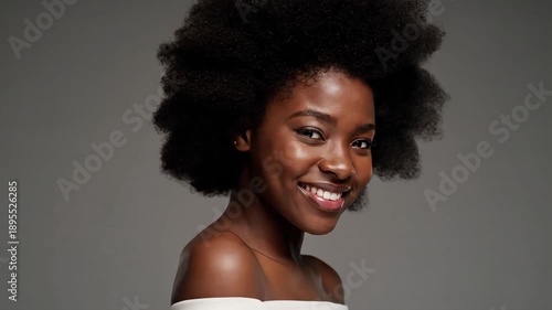 Wallpaper Mural Studio portrait of young woman with natural afro hair expressing beauty and identity Torontodigital.ca