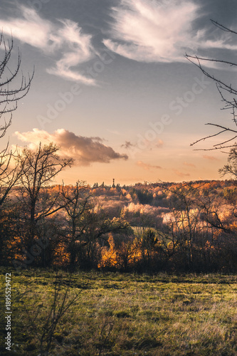 Beautiful valley landscape at sunset with golden hour light
