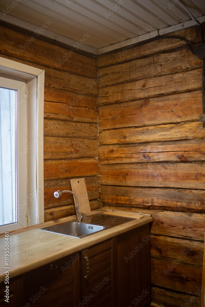 Obraz premium a wooden beam wall in the kitchen