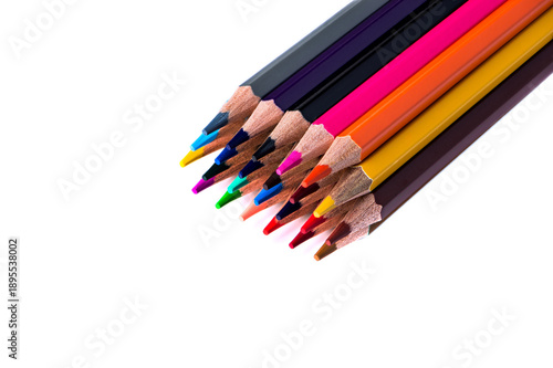 Close-up of sharpened colorful wooden pencils arranged diagonally, isolated on white background. Creative concept for art, education, design, and stationery with copy space.
