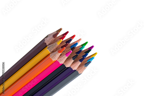 Close-up of colorful sharpened wooden pencils arranged diagonally, isolated on white background with copy space. Concept of creativity, art, education, and design.
