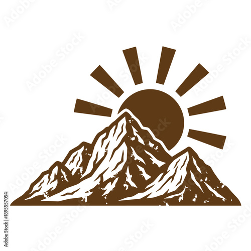 Vintage Grunge texture mountain range landscape with sun rising behind peaks and rays extending outwards in a natural scenic view