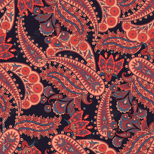 Paisley seamless vector pattern with fantastic flowers and leaves. Bohemian textile print inspired by batik. Vintage style
