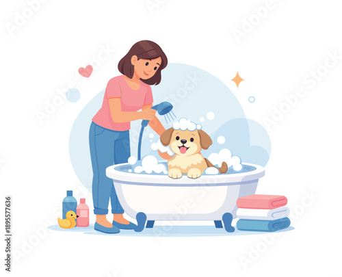 Woman bathing happy dog in bathtub with bubbles and towels