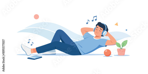 Relaxed man enjoying music with headphones and smartphone indoors