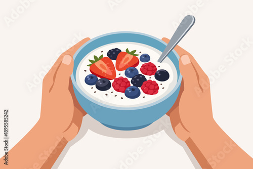 Hands holding a bowl of yogurt with fresh berries and seeds for a healthy breakfast