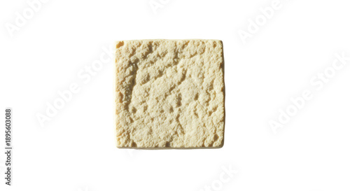 Single Square Cracker Isolated on Beige Background with Soft Lighting