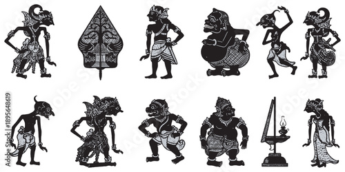 Collection of traditional Indonesian Wayang Kulit shadow puppets and a lamp.