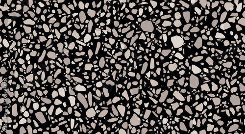Close-up of dark terrazzo texture with scattered stone fragments