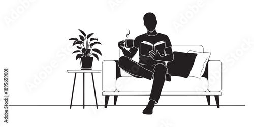 Silhouette of a person sitting on a couch reading a book and holding a steaming cup of coffee, conveying comfort and relaxation.