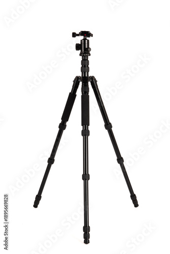 Black professional tripod for camera isolated on white background