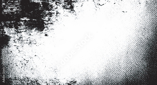 Abstract grainy texture with dark smudges and a predominantly white field